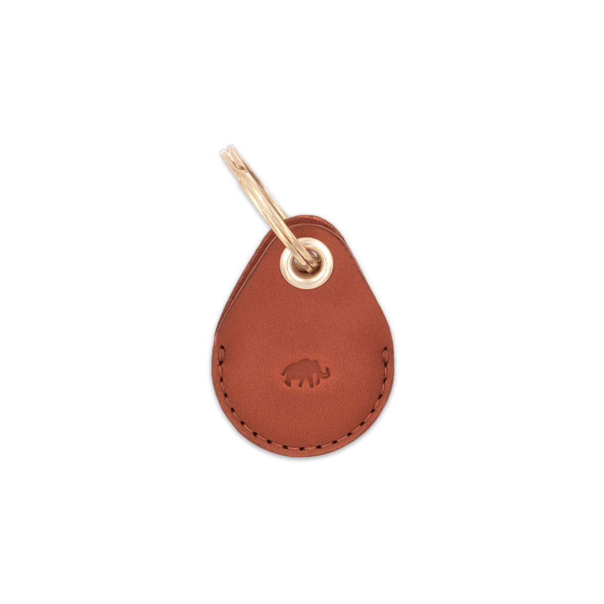 Brown leather AirTag case with debossed Woolly Made logo and brass hardware.