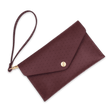 Burgundy leather Clutch, decorative perforation, attached matching wrist strap, and brass hardware.
