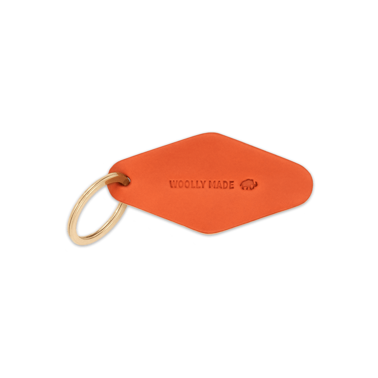 Orange leather diamond-shaped Hotel Keychain with hand-pressed Woolly Made logo and brass hardware.