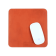 Orange leather Mouse Pad with Apple Mouse.
