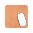 Tan leather Mouse Pad with Apple Mouse.