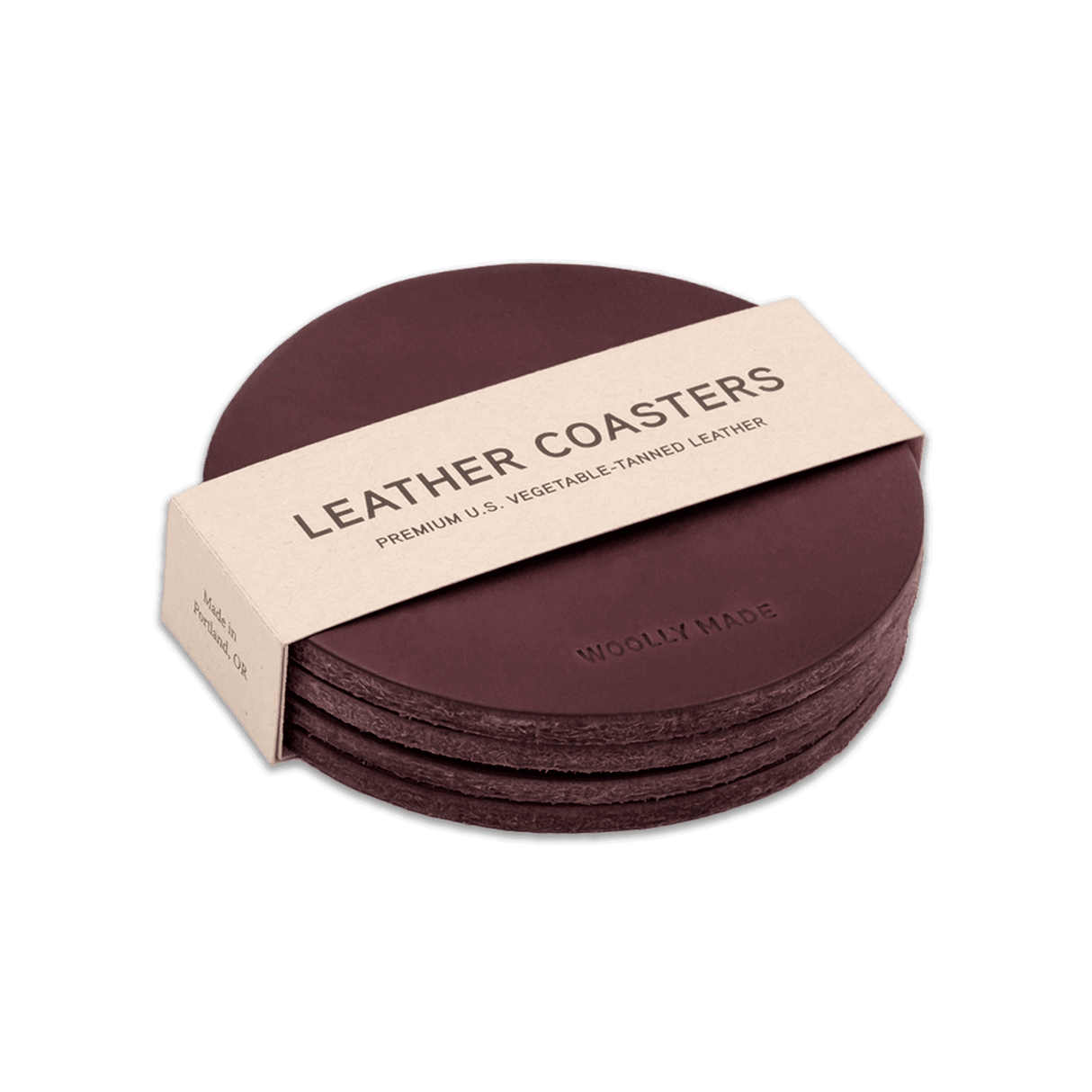 Burgundy leather round coaster set with hand-pressed Woolly Made logo stacked.