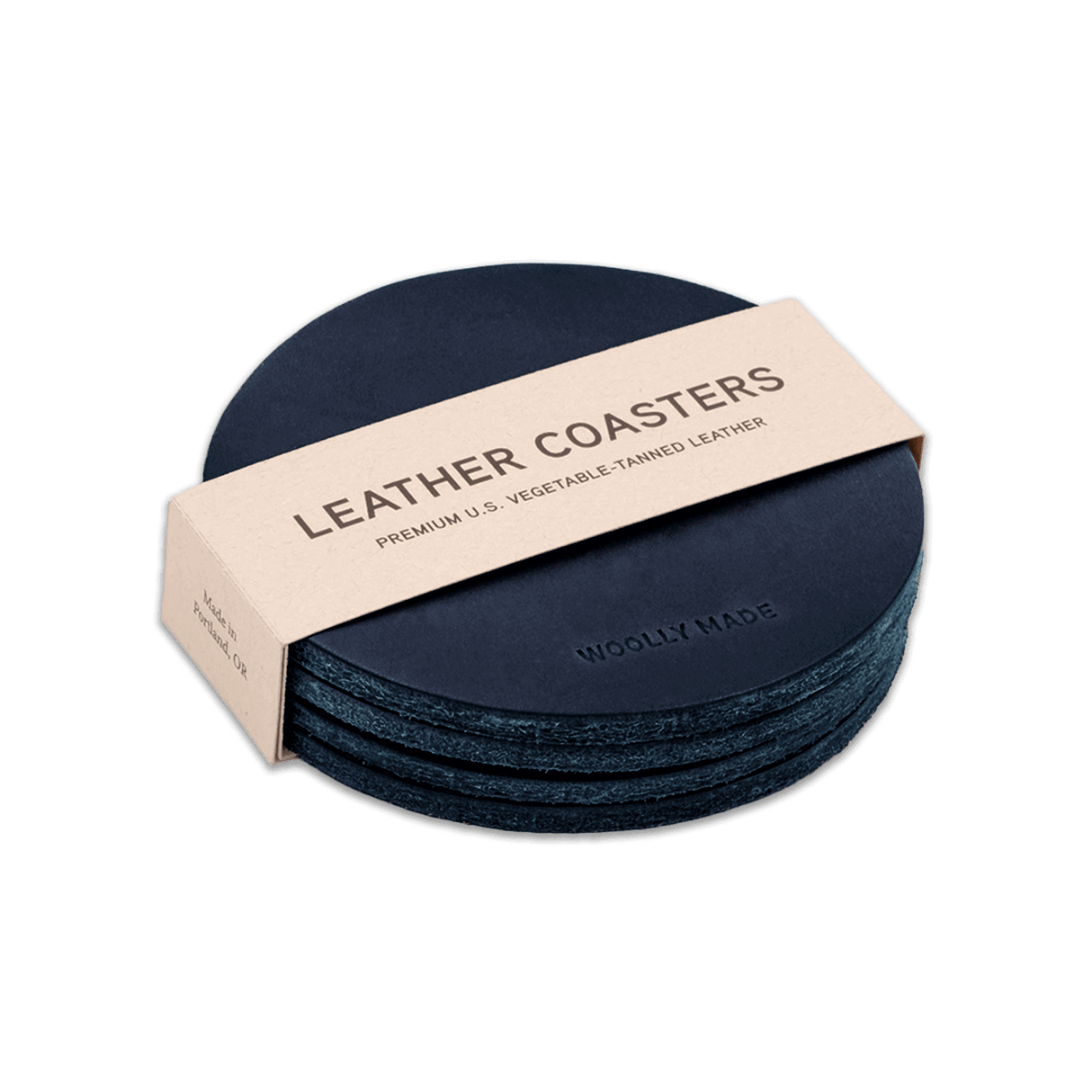 Navy leather round coaster set with hand-pressed Woolly Made logo stacked.