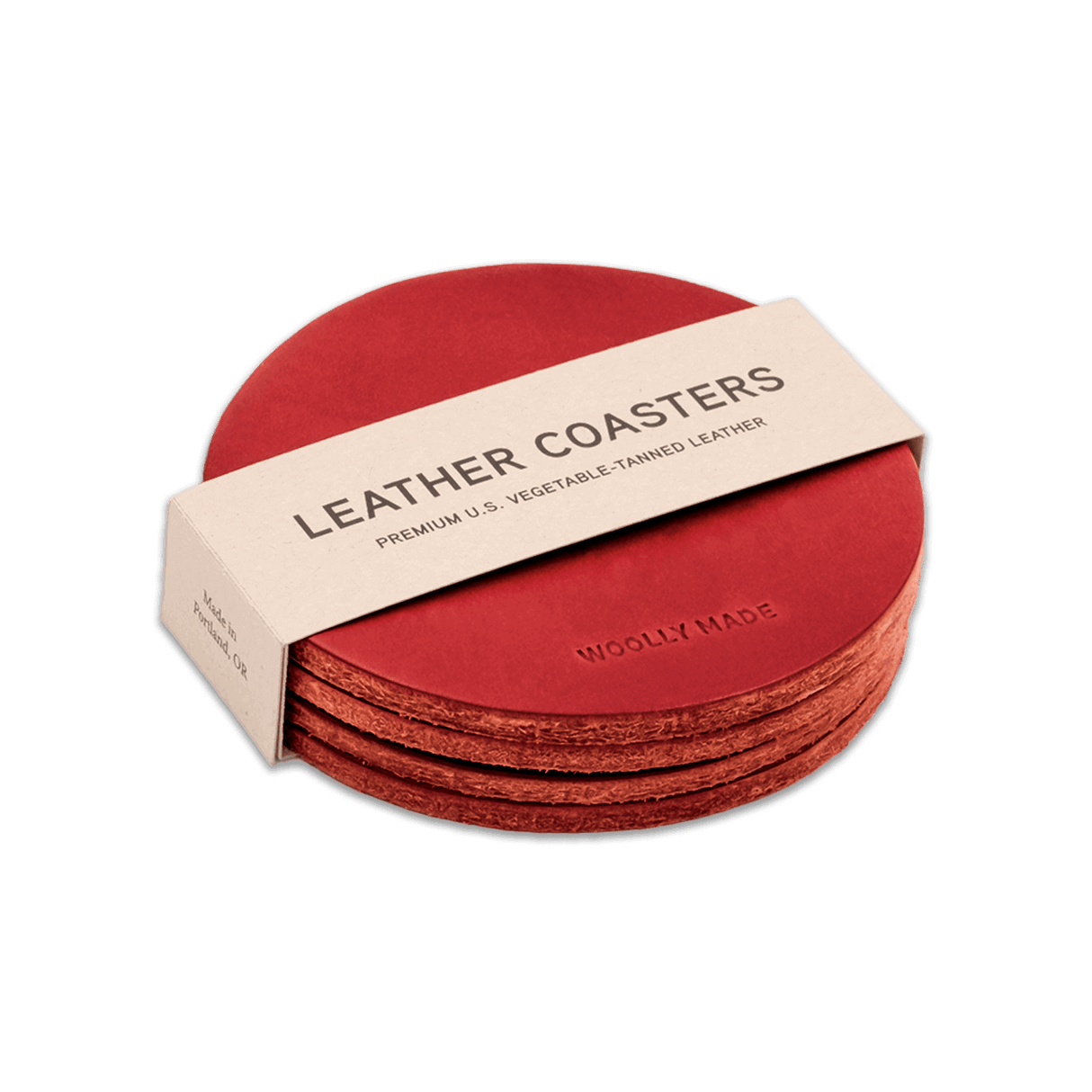 Red leather round coaster set with hand-pressed Woolly Made logo stacked.
