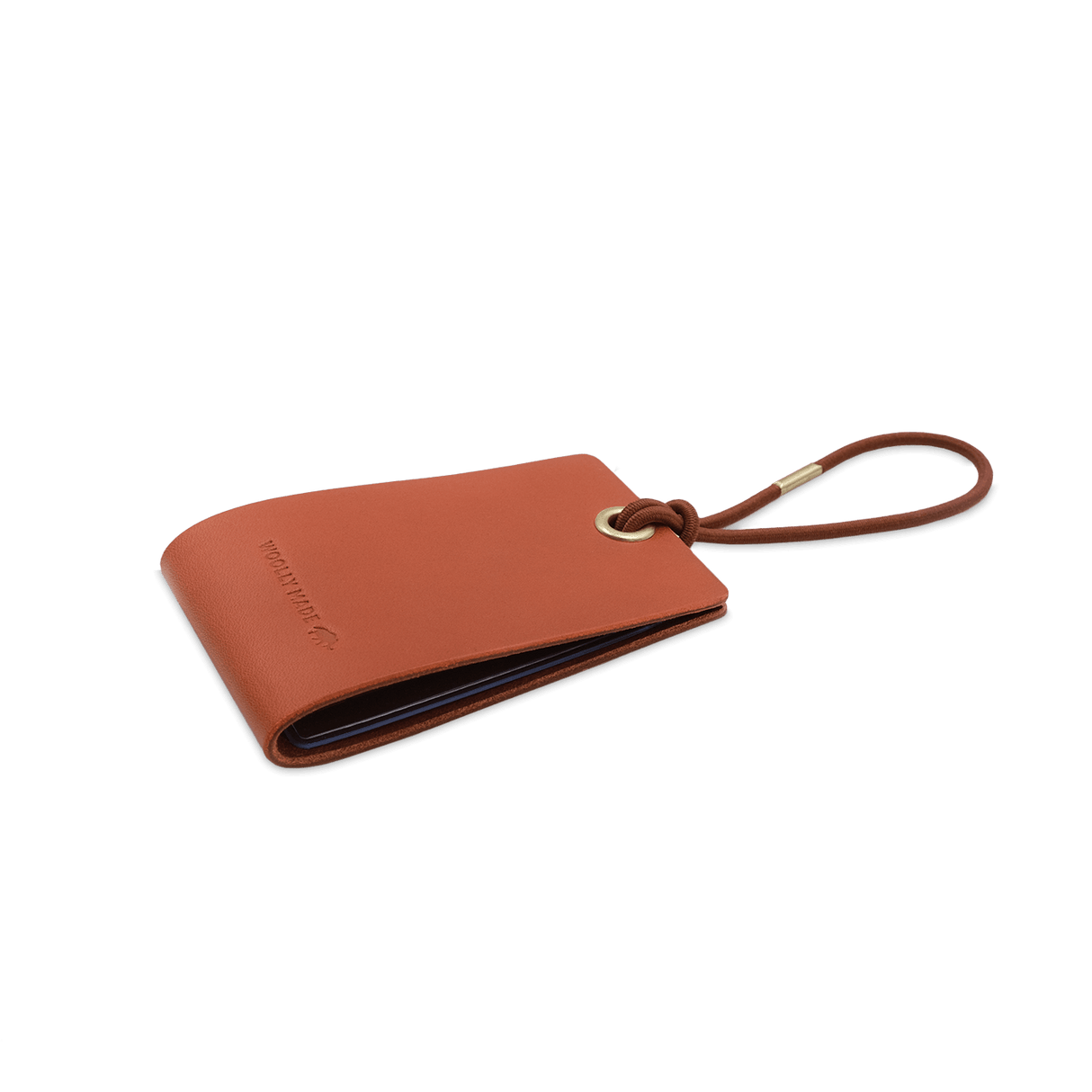 Woolly Made Standard Luggage Tag in Brown with elastic cord 3/4 view.