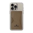 Olive leather Stick-On Wallet with decorative perforation and etched Woolly Made logo on iPhone.