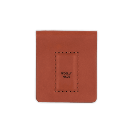 Brown leather Cash Magnet Wallet top down view with etched Woolly Made logo.