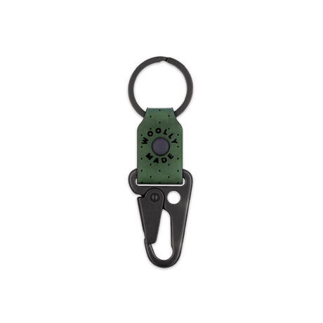 Green leather Clip Keychain, etched Woolly Made logo, decorative perforation, and black hardware.