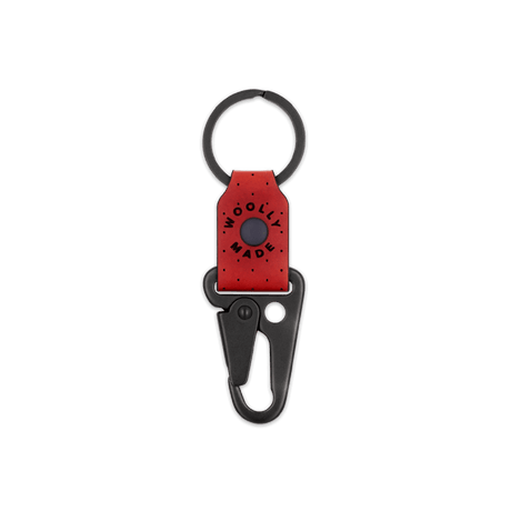 Red leather Clip Keychain with etched Woolly Made logo, decorative perforation, and black hardware.