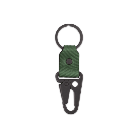 Green leather Texture Clip Keychain, black hardware, hand-pressed design, Woolly Made logo.