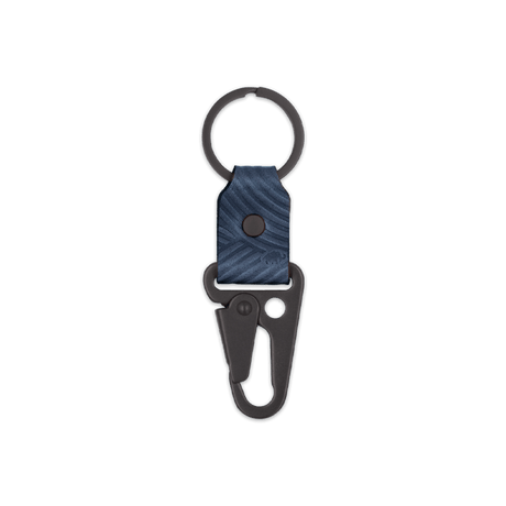 Navy leather Texture Clip Keychain, black hardware, hand-pressed design, Woolly Made logo.