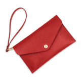 Red leather Clutch with decorative perforation, attached matching wrist strap, and brass hardware.