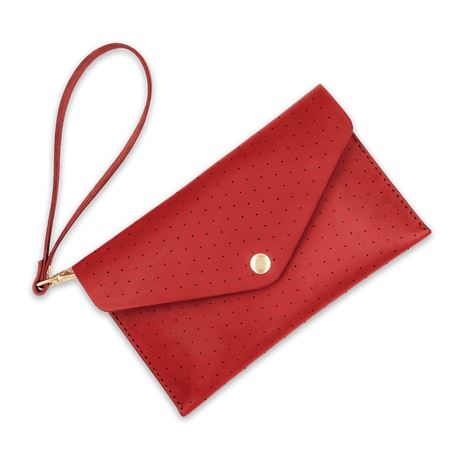 Red leather Clutch with decorative perforation, attached matching wrist strap, and brass hardware.