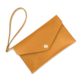 Gold leather Clutch with decorative perforation, attached matching wrist strap, and brass hardware.