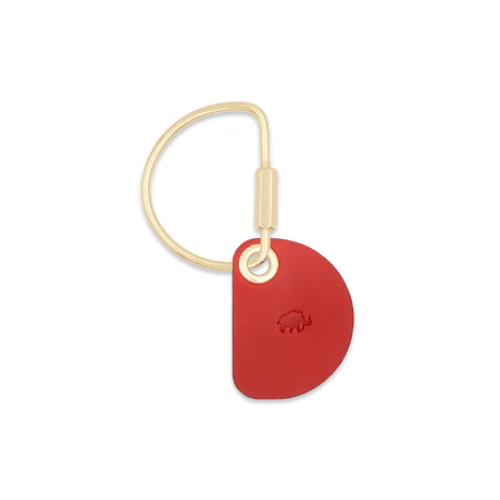 Red Crescent Keychain with brass hardware.