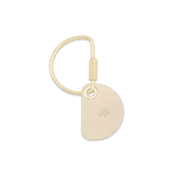 Tusk Crescent Keychain with brass hardware.