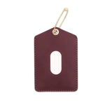 Burgundy leather Luggage Tag with blank info card and window, and brass hardware.