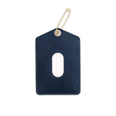 Navy leather Luggage Tag with blank info card and window, and brass hardware.