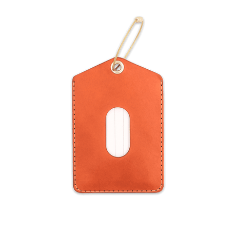 Orange leather Luggage Tag with blank info card and window, and brass hardware.