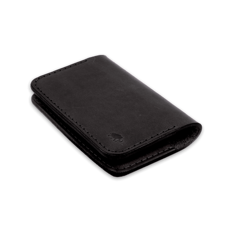 Black glazed leather Flip Wallet 3/4 angle view with hand-pressed Woolly Made logo.