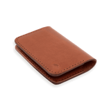 Brown glazed leather Flip Wallet 3/4 angle view with hand-pressed Woolly Made logo.