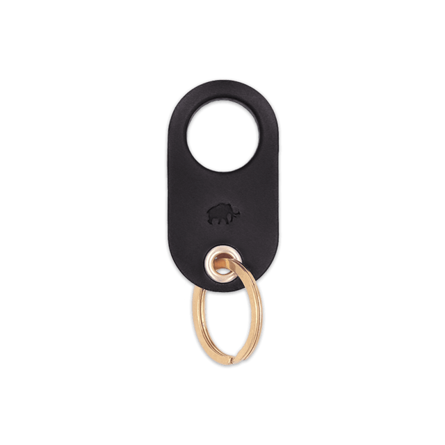 Black leather Grip Keychain with hand-pressed Woolly Made logo and brass hardware.