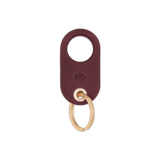 Burgundy leather Grip Keychain with hand-pressed Woolly Made logo and brass hardware.