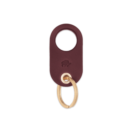 Burgundy leather Grip Keychain with hand-pressed Woolly Made logo and brass hardware.