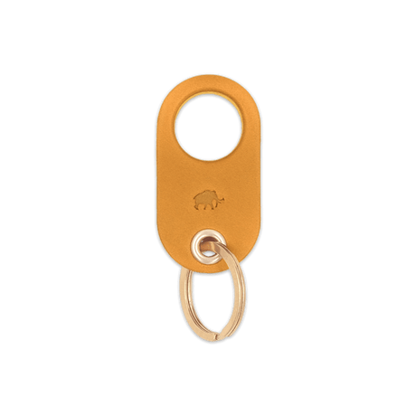 Gold leather Grip Keychain with hand-pressed Woolly Made logo and brass hardware.