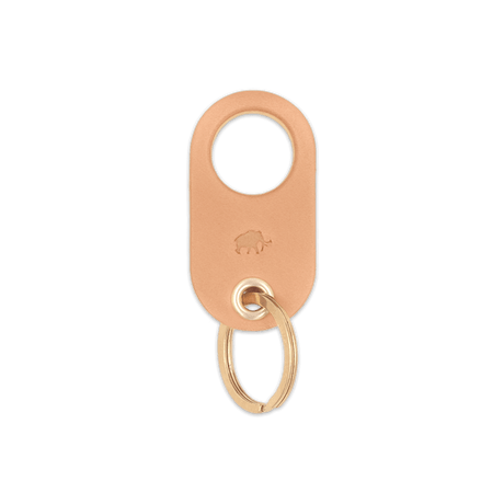 Natural leather Grip Keychain with hand-pressed Woolly Made logo and brass hardware.