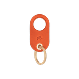 Orange leather Grip Keychain with hand-pressed Woolly Made logo and brass hardware.