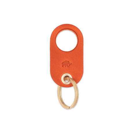 Orange leather Grip Keychain with hand-pressed Woolly Made logo and brass hardware.