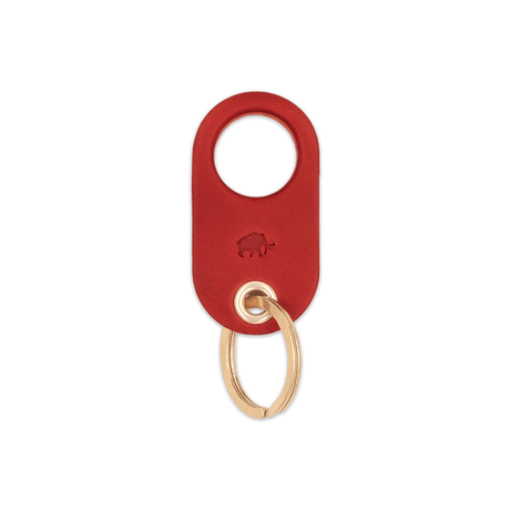 Red leather Grip Keychain with hand-pressed Woolly Made logo and brass hardware.