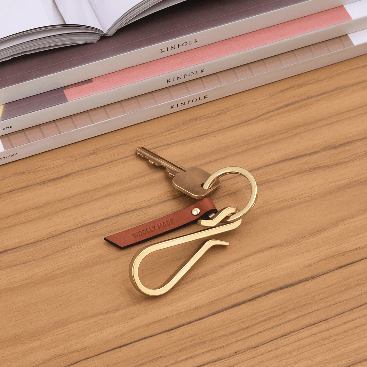 Hairpin Keychain in brown leather in a lifestyle scene.