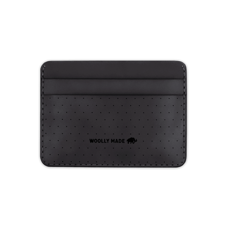 Black leather Half Wallet with decorative perforation and etched Woolly Made logo.