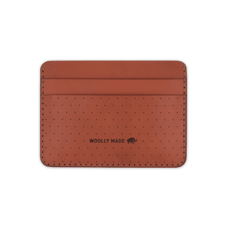 Brown leather Half Wallet with decorative perforation and etched Woolly Made logo.