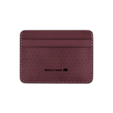 Burgundy leather Half Wallet with decorative perforation and etched Woolly Made logo.