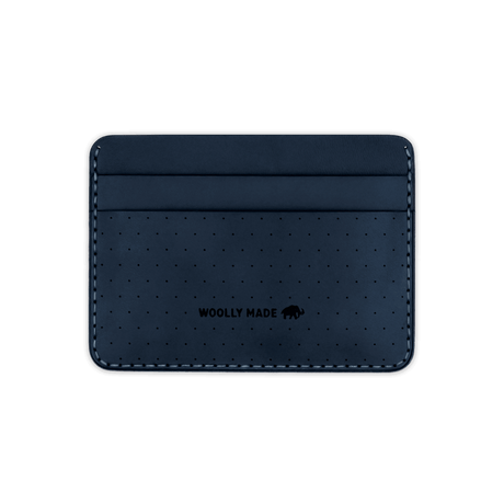 Navy leather Half Wallet with decorative perforation and etched Woolly Made logo.