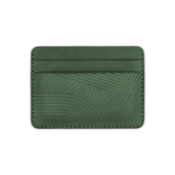 Green leather Texture with hand-pressed design and Woolly Made logo.