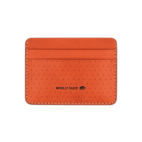 Orange leather Half Wallet with decorative perforation and etched Woolly Made logo.