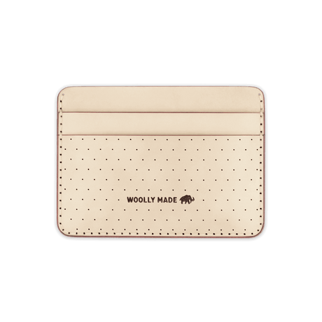 Tusk leather Half Wallet with decorative perforation and etched Woolly Made logo.