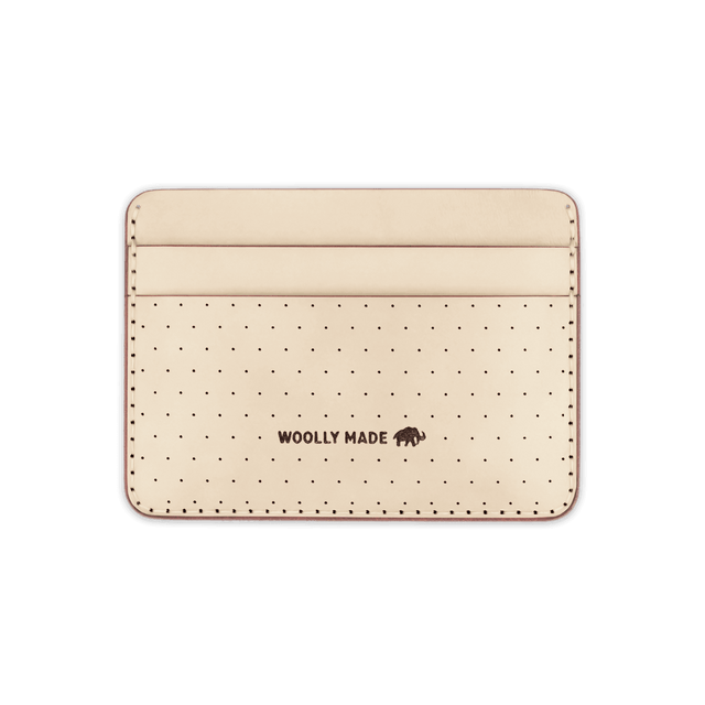 Tusk leather Half Wallet with decorative perforation and etched Woolly Made logo.