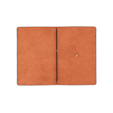 Brown glazed leather Journal open view blank notebook and elastic strap.