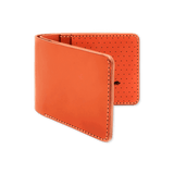 Orange leather, decorative perforation and etched Woolly Made logo.