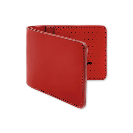 Red leather, decorative perforation and etched Woolly Made logo.