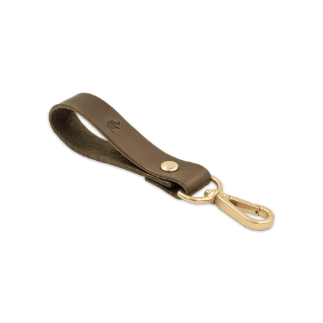 Olive leather Loop Keychain 3/4 angle view with brass hardware and hand-pressed Woolly Made logo.