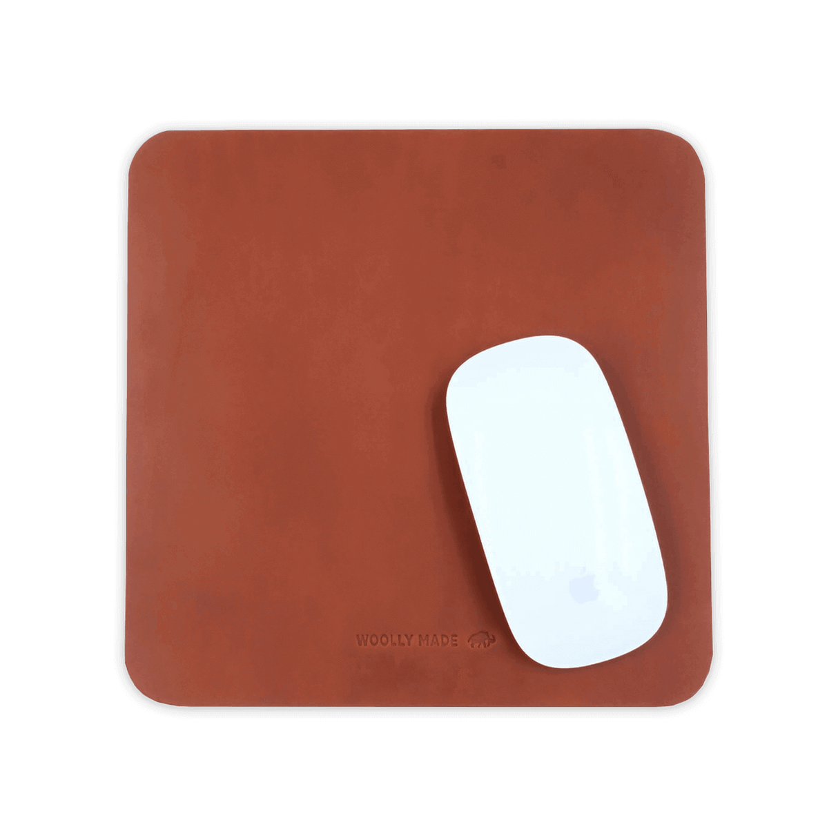 Brown leather Mouse Pad with Apple Mouse.