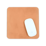 Tan leather Mouse Pad with Apple Mouse.