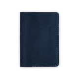 Navy leather Passport Cover closed view.