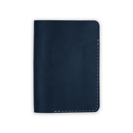 Navy leather Passport Cover closed view.